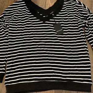 2 Medium Heyson brand tops ordered from online boutique.